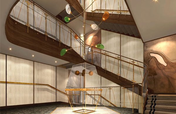 Das Atrium ist mit seiner eleganten Wendeltreppe der Mittelpunkt
